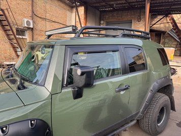 Дефлектори вікон клеючі темні Toyota FJ Cruiser 2007-2014 передні AVS 92735 92735 фото