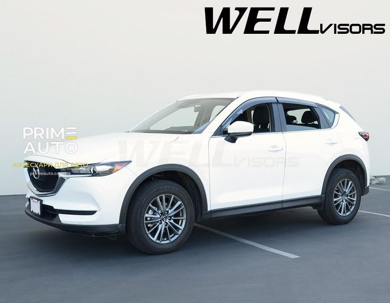 Дефлектори вікон, к-т 4 шт, з чорним хромованим молдингом Mazda CX-5 2017 - 2023 Wellvisors 3-847MZ018 3-847MZ018 фото