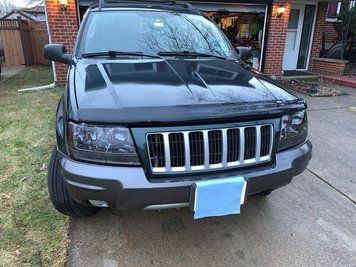 Дефлектор капоту Jeep Grand Cherokee 1999-2004 Bugflector темно-димчастий AVS 23353 23353 фото