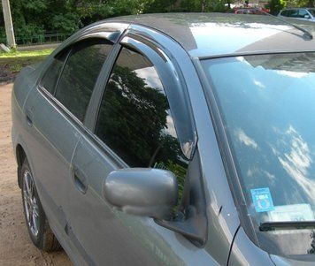 Дефлектори вікон передні+задні к-т 4шт темні Nissan Almera 2000 - 2006 EGR 92463007B 92463007B фото